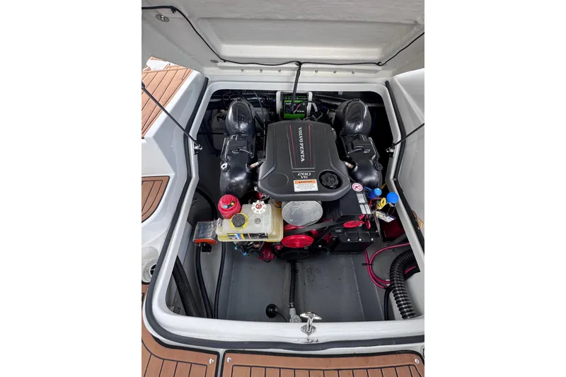 Slide: The Image of Engine compartment of 2025 Crownline Eclipse E235 boat, featuring Volvo Penta V8 engine. - 38