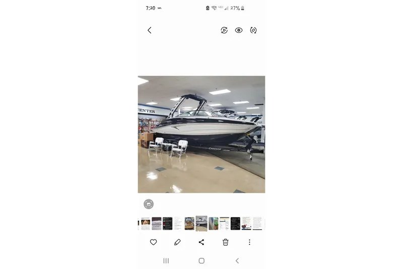 Slide: The Image of 2025 Crownline Eclipse E235 boat displayed indoors on a showroom floor. - 4