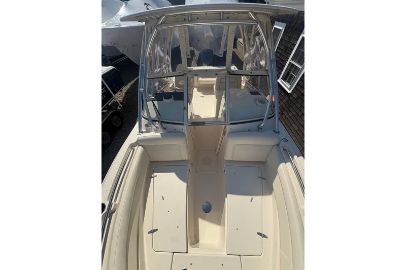 Slide: The Image of 2017 Grady-White Freedom 235 boat interior, featuring spacious seating and sleek design. - 6