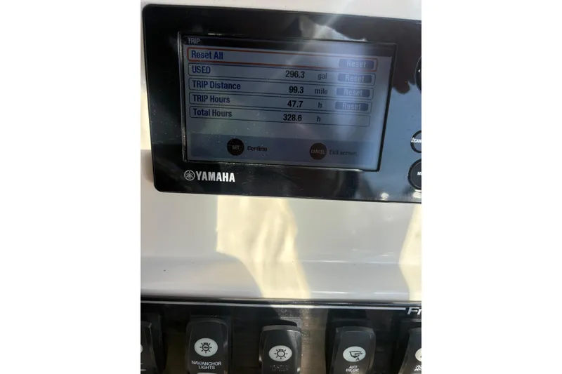 Slide: The Image of Yamaha display on 2017 Grady-White Freedom 235 showing trip data and settings. - 7