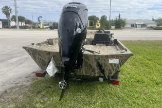 Slide: The Image of 2026 Crestliner 1760 Retriever SC boat with outboard motor on trailer. - 6