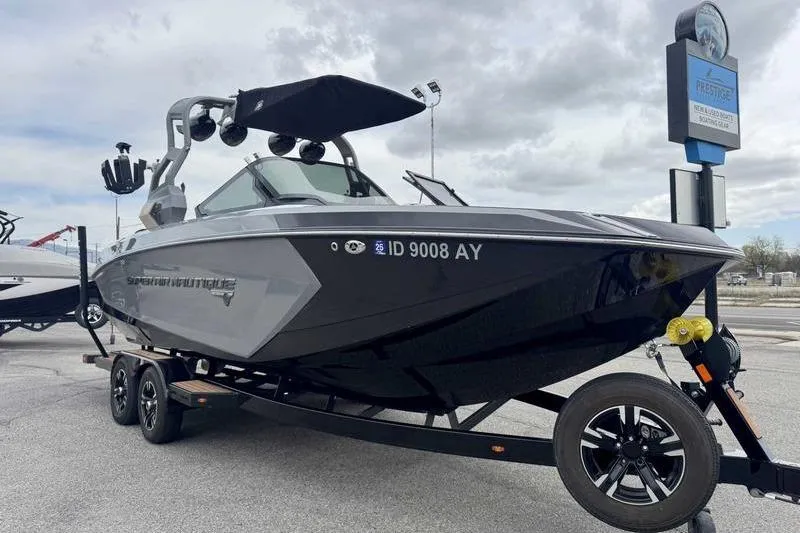 Slide: The Image of 2019 Nautique Super Air Nautique G23 boat on trailer, parked outdoors. - 6