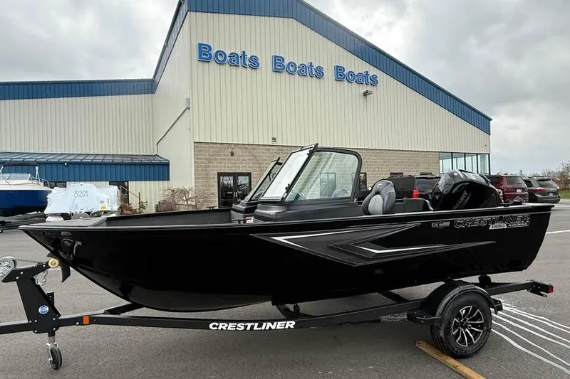The Image of 2026 Crestliner 1650 Kodiak boat displayed outside dealership. - 0
