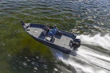 Slide: The Image of Manufacturer Provided Image: 2026 Crestliner 1650 Kodiak boat speeding on open water, showcasing sleek design and performance. - 22