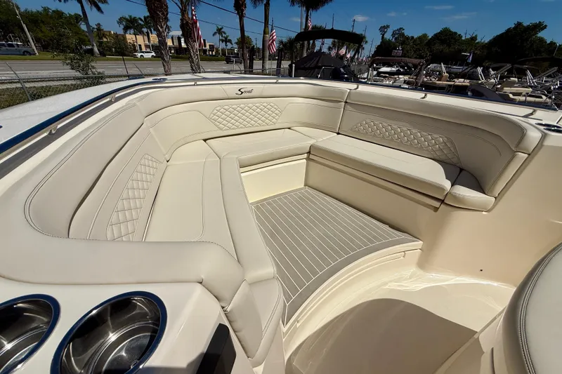 Slide: The Image of Luxurious seating area on a 2026 Scout 330 LXF boat with elegant upholstery. - 23