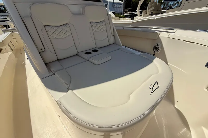 Slide: The Image of Luxurious seating on 2026 Scout 330 LXF boat, featuring elegant design and comfort. - 28