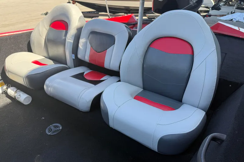Slide: The Image of 2007 Tracker Pro Team 175 TXW boat seats, featuring gray and red upholstery. - 11