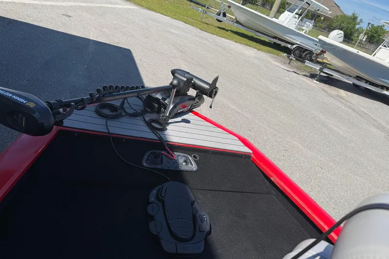 Slide: The Image of 2007 Tracker Pro Team 175 TXW boat with Minn Kota trolling motor on deck. - 13