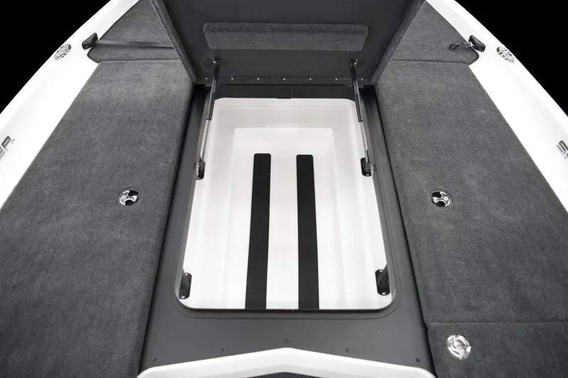 Slide: The Image of Manufacturer Provided Image: 2026 Skeeter ZXR21 SE boat storage compartment with open lid, showcasing spacious interior. - 17