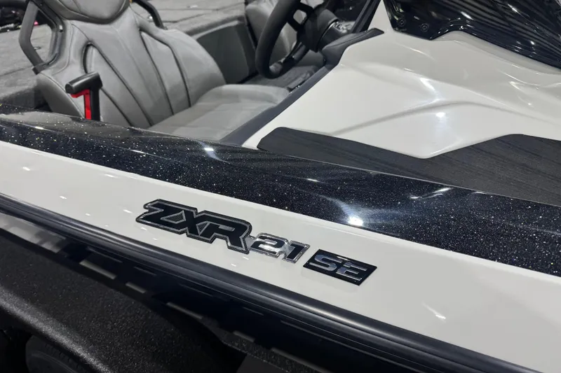 Slide: The Image of 2026 Skeeter ZXR21 SE boat interior with sleek design and logo detail. - 2