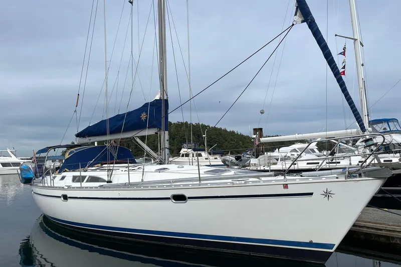 The Image of 2001 Jeanneau Sun Odyssey 45.2 sailboat docked at marina. - 0