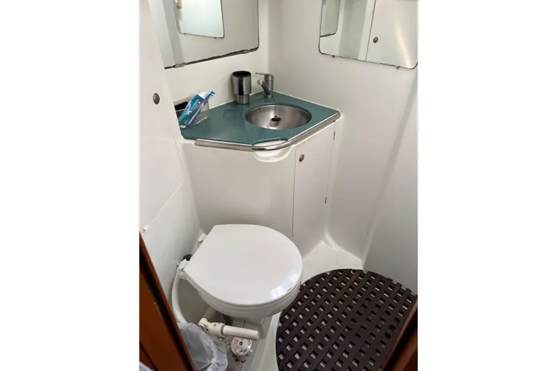 Slide: The Image of Compact bathroom in 2001 Jeanneau Sun Odyssey 45.2 yacht with sink and toilet. - 22