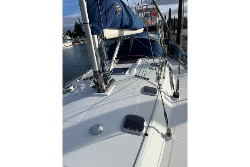 Slide: The Image of Jeanneau Sun Odyssey 45.2 sailboat deck, 2001 model, docked at marina. - 31