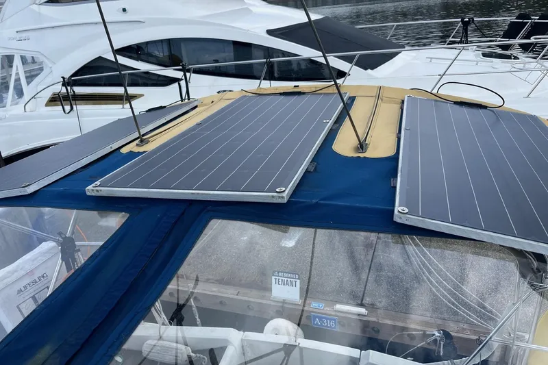 Slide: The Image of Jeanneau Sun Odyssey 45.2 sailboat with solar panels on deck, 2001 model. - 34