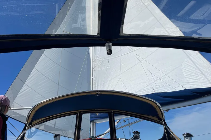 Slide: The Image of Sailing on a 2001 Jeanneau Sun Odyssey 45.2 with white sails against a clear blue sky. - 35