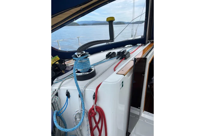 Slide: The Image of Cockpit view of 2001 Jeanneau Sun Odyssey 45.2 sailboat with ropes and winch. - 39
