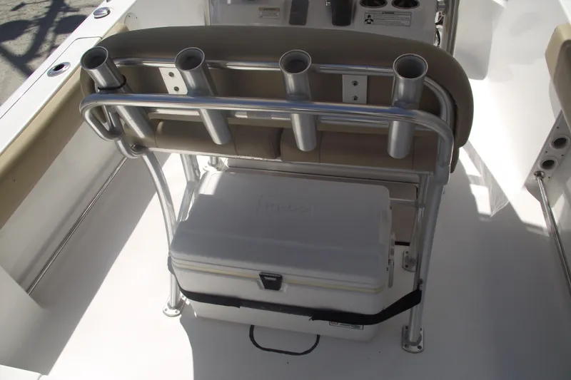 Slide: The Image of 2016 Sportsman Open 212 Center Console boat with rod holders and cooler storage. - 21