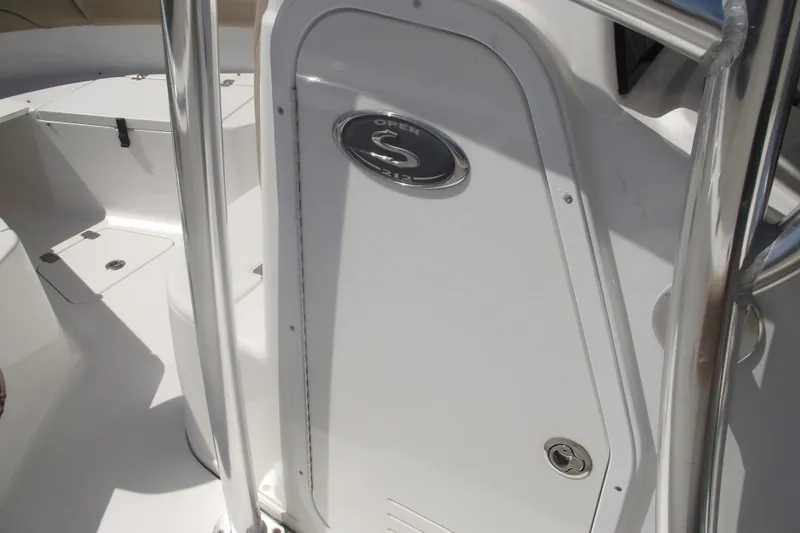 Slide: The Image of 2016 Sportsman Open 212 Center Console boat interior with stainless steel details. - 23