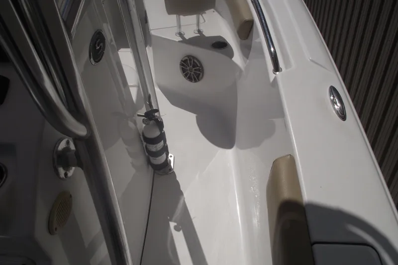 Slide: The Image of 2016 Sportsman Open 212 Center Console interior with fire extinguisher and speaker. - 27