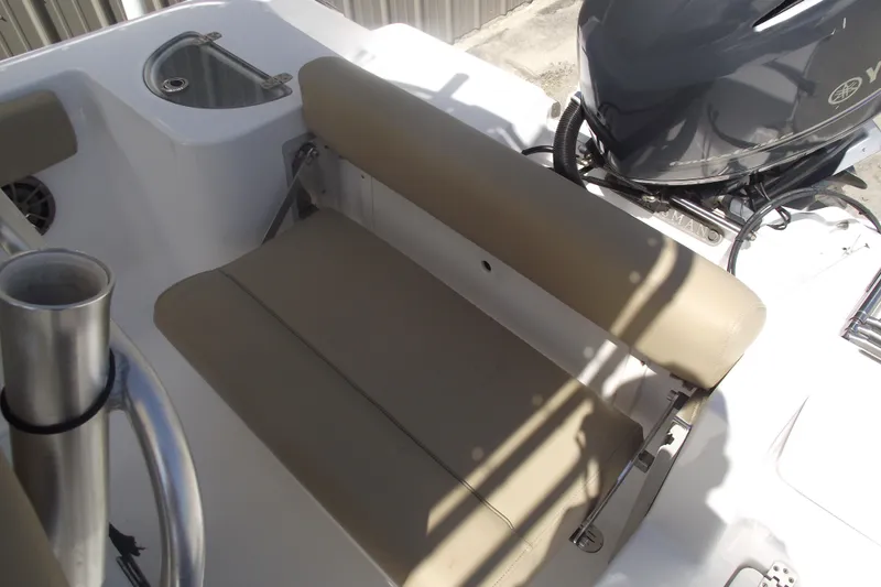 Slide: The Image of 2016 Sportsman Open 212 Center Console boat seating and engine detail. - 34