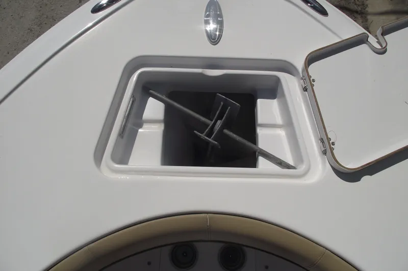 Slide: The Image of Anchor storage compartment on 2016 Sportsman Open 212 Center Console boat. - 7