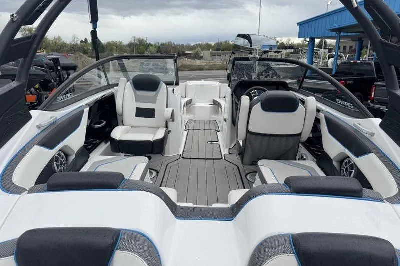 Slide: The Image of 2021 Yamaha Boats 212X interior with sleek seating and modern design. - 17