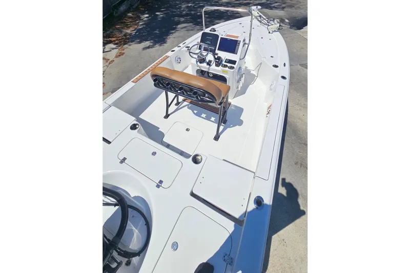 Slide: The Image of 2019 Sea Pro 208 Bay boat interior with console and seating. - 19
