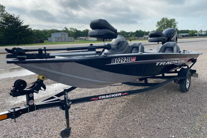 Slide: The Image of 2022 Tracker Pro Team 175 TXW fishing boat on trailer, parked outdoors. - 3
