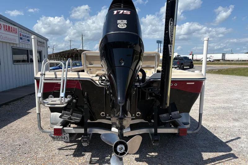 Slide: The Image of 2018 Blue Wave 2200 PureBay boat with Yamaha outboard motor, parked outdoors. - 5