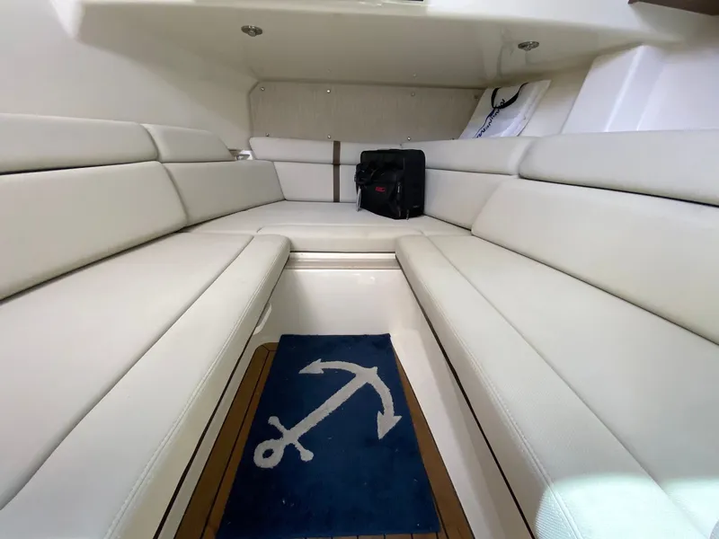 Slide: The Image of Interior of 2020 Boston Whaler 350 Realm with white seating. - 18