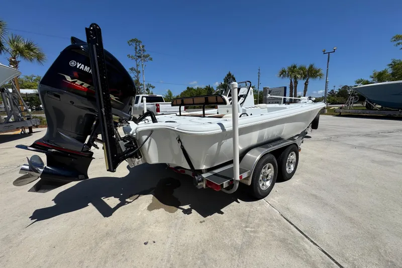 Slide: The Image of 2016 Yellowfin 21 Hybrid boat on trailer with Yamaha outboard motor. - 12