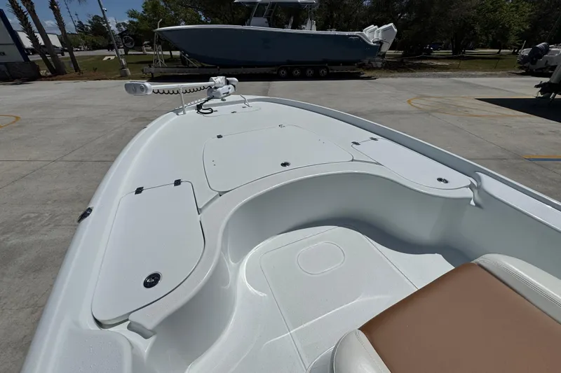 Slide: The Image of 2016 Yellowfin 21 Hybrid boat interior with seating and storage compartments. - 20