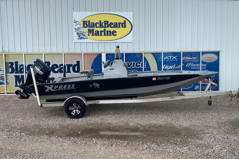 The Image of 2018 Xpress H20B Bay boat on trailer at BlackBeard Marine dealership. - 0
