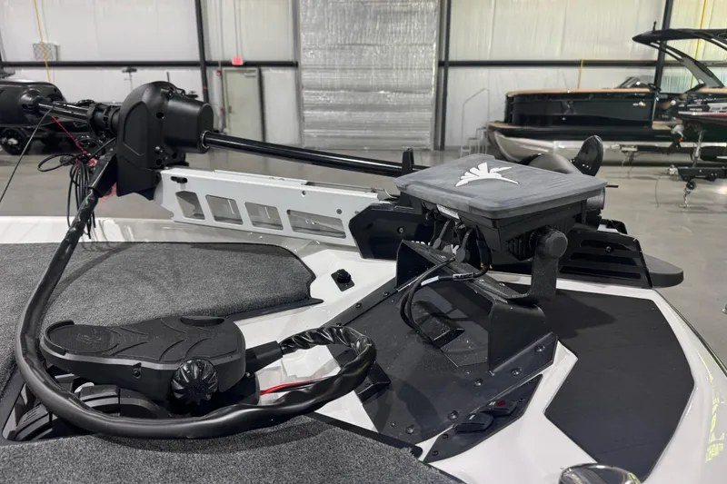 Slide: The Image of 2026 Skeeter ZXR21 SE boat with advanced navigation equipment in a showroom. - 3