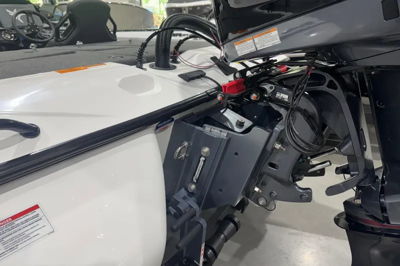 Slide: The Image of 2026 Skeeter ZXR21 SE boat engine compartment, showcasing detailed wiring and components. - 8