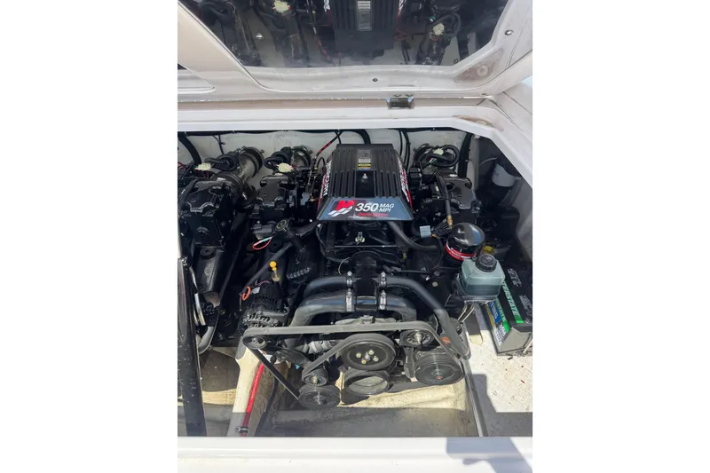 Slide: The Image of Engine compartment of a 2001 Donzi 28 ZX boat featuring a 350 MAG MPI engine. - 10