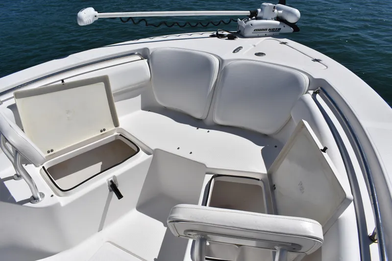 Slide: The Image of 2014 Sea Fox 226 Commander boat interior with open storage compartments and seating. - 11