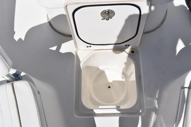 Slide: The Image of Open storage compartment on 2014 Sea Fox 226 Commander boat deck. - 14