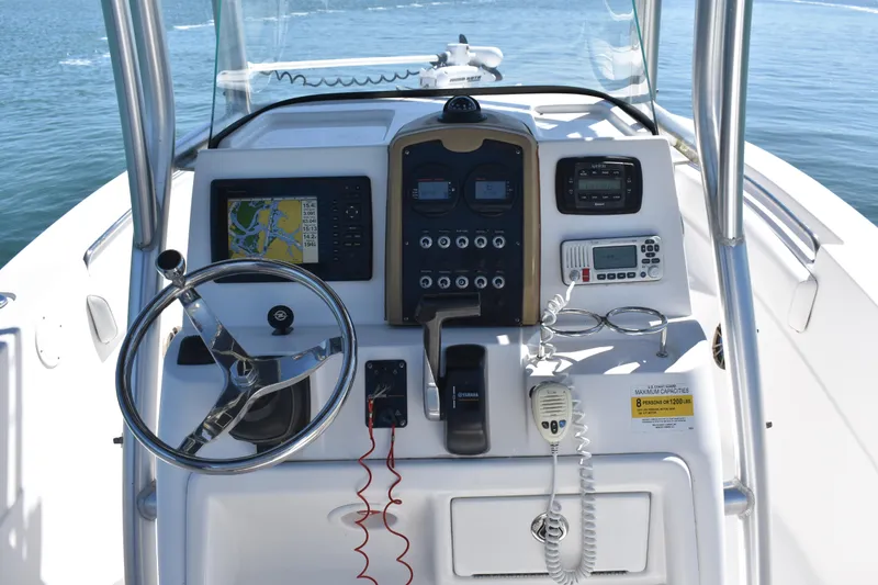 Slide: The Image of 2014 Sea Fox 226 Commander boat dashboard with navigation and communication equipment. - 19