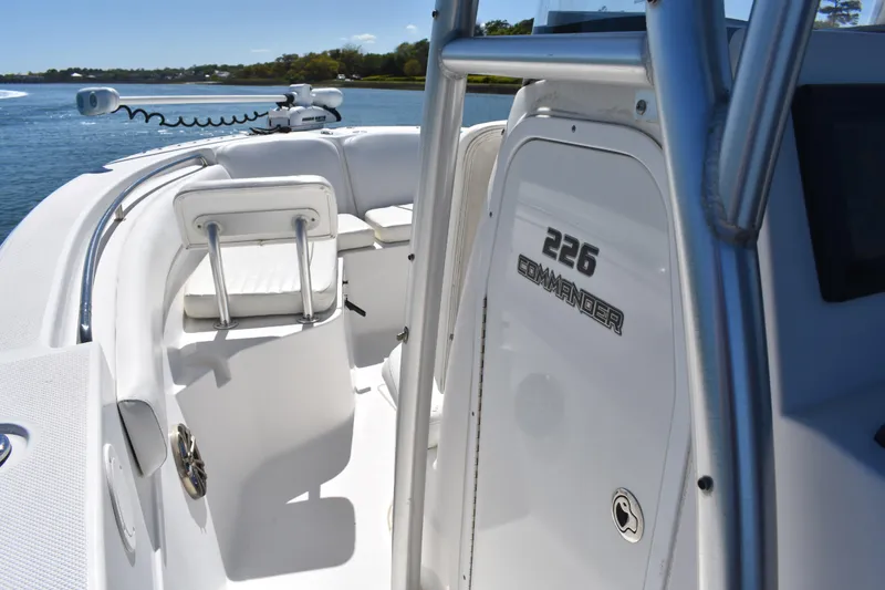 Slide: The Image of 2014 Sea Fox 226 Commander boat interior with seating and console details. - 20