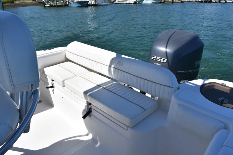 Slide: The Image of 2014 Sea Fox 226 Commander boat with Yamaha 250 engine on calm water. - 22