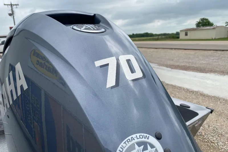 Slide: The Image of Outboard motor on 2026 G3 Sportsman 1610 boat, featuring Yamaha branding and "70" decal. - 5