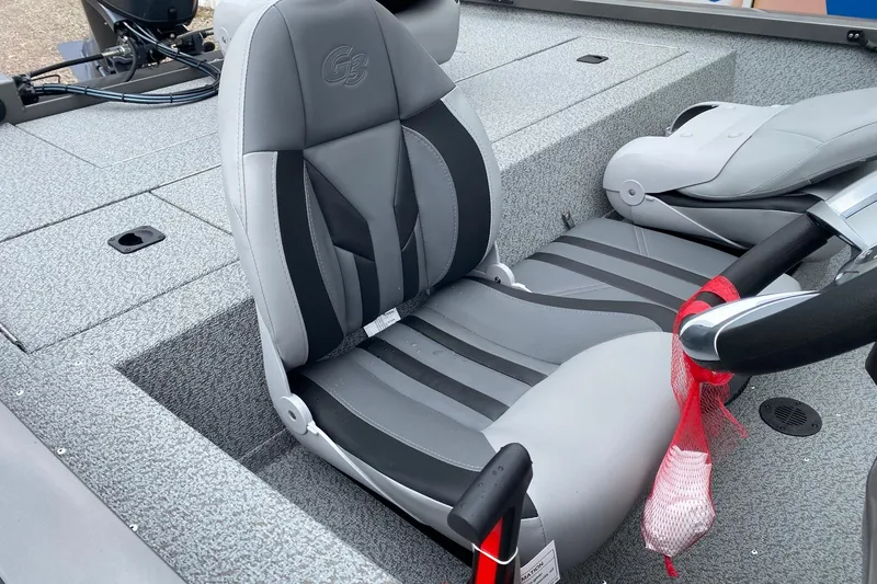Slide: The Image of 2026 G3 Sportsman 1610 boat interior with gray and black seating. - 8