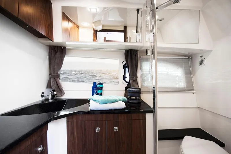 Slide: The Image of Manufacturer Provided Image: Luxurious bathroom in 2026 Marex 375 yacht with modern amenities. - 12
