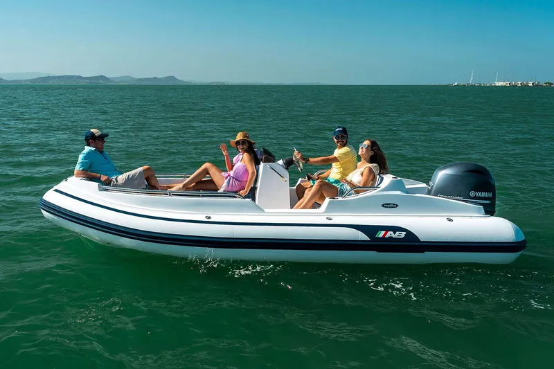 Slide: The Image of Manufacturer Provided Image: 2026 AB Inflatables Nautilus 17 DLX on water with passengers. - 2