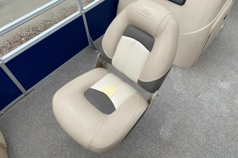 Slide: The Image of Beige and gray seat on 2016 Sun Tracker Fishin' Barge 22 DLX boat. - 10