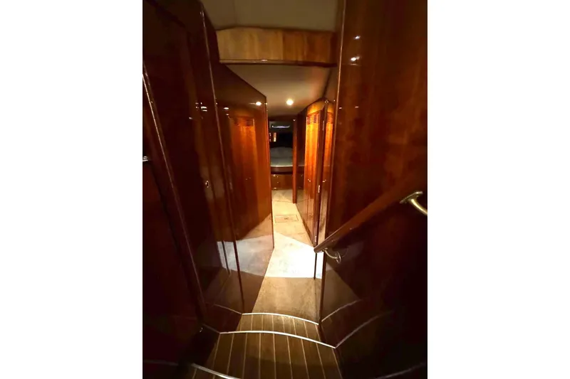 Slide: The Image of Luxurious wooden interior hallway of 2004 Riviera 51 Flybridge yacht. - 13