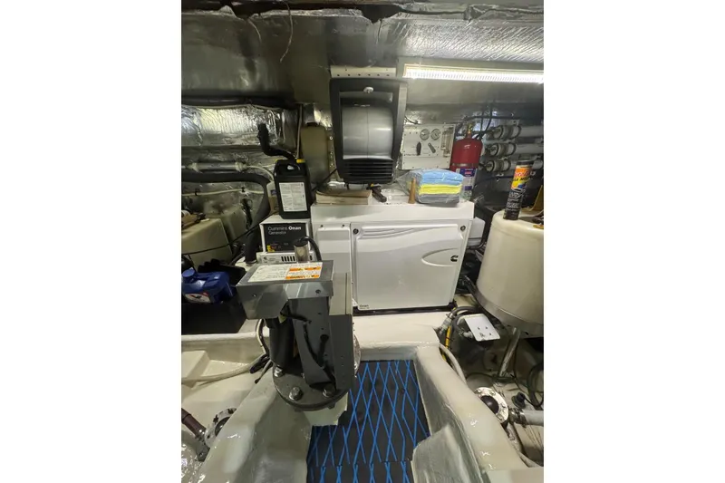 Slide: The Image of Engine room of 2004 Riviera 51 Flybridge with Cummins Onan generator and equipment. - 35