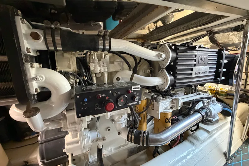 Slide: The Image of Engine room of a 2004 Riviera 51 Flybridge yacht with CAT marine power. - 34