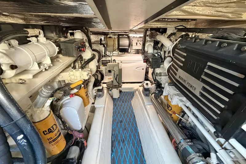 Slide: The Image of Engine room of 2004 Riviera 51 Flybridge yacht with CAT marine power systems. - 36